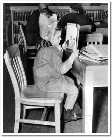 Sudbury Public Library, March 8, 1947. Gail Dingle reading.